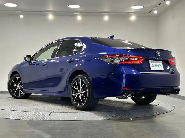 トヨタ カムリ WSレザーパッケージ 愛知県 2021(令3)年 2.8万km ダークブルーマイカM 純正９インチディスプレイオーディオ/衝突軽減ブレーキ/レーダークルーズコントロール　/レーンキープアシスト/クリアランスソナー/ブラインドスポットモニター/ビルトインＥＴＣ２．０/レザーシート/シートヒーター/バックカメラ/パドルシフト/ドライブレコーダー/カラーヘッドアップディスプレイ　/純正18インチアルミホイール/純正フロアマット/4WD