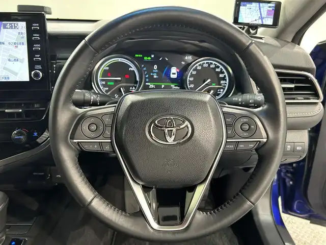 トヨタ カムリ WSレザーパッケージ 愛知県 2021(令3)年 2.8万km ダークブルーマイカM 純正９インチディスプレイオーディオ/衝突軽減ブレーキ/レーダークルーズコントロール　/レーンキープアシスト/クリアランスソナー/ブラインドスポットモニター/ビルトインＥＴＣ２．０/レザーシート/シートヒーター/バックカメラ/パドルシフト/ドライブレコーダー/カラーヘッドアップディスプレイ　/純正18インチアルミホイール/純正フロアマット/4WD