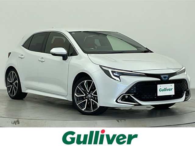 トヨタ カローラ スポーツ ハイブリッドG Z 宮城県 2023(令5)年 1.5万km プラチナホワイトパールマイカ ワンオーナー/純正10.5インチディスプレイオーディオ/(USB/FM/AM/Miracast)/フルセグTV/Bluetooth/ETC2.0/バックカメラ/前後ドライブレコーダー/レーダー探知機/レーダークルーズコントロール/ブラインドスポットモニター/ハーフレザー/シートヒーター/ステアリングヒーター/プッシュスタート/スマートキー/スペアキー/SOSスイッチ/オートライト/オートマチックハイビーム/LEDヘッドライト/ヘッドライトレベライザー/ワイパーデアイサー/テイン車高調/純正18インチアルミホイール/社外フロアマット