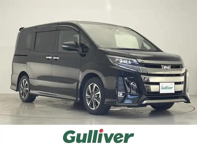 トヨタ ノア Si ダブルバイビー 滋賀県 2018(平30)年 6.3万km ブラック 禁煙車/純正10型ナビ/CD/DVD/Bluetooth/SD/フルセグTV/バックカメラ/フリップダウンモニター/ETC/両側パワースライドドア/クルーズコントロール/トヨタセーフティセンス/レーンキープアシスト/ドライブレコーダー/ハーフレザーシート/純正アルミホイール/アイドリングストップ/LEDヘッドライト/オートハイビーム
