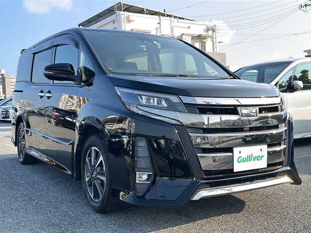 トヨタ ノア Si ダブルバイビー 沖縄県 2018(平30)年 6.3万km ブラック 純正ナビ　/（ＡＭ／ＦＭ／ＣＤ／ＤＶＤ／ＢＴ）　/フルセグＴＶ　/バックモニター　/後席モニター　/両側パワスラ　/レーンキープアシスト　/クルーズコントロール　/衝突軽減　/ドラレコ　/ＥＴＣ　/ハーフレザー/純正フロアマット/純正16AW/スマートキー/LEDヘッドライト/オートライト/オートマチックハイビーム