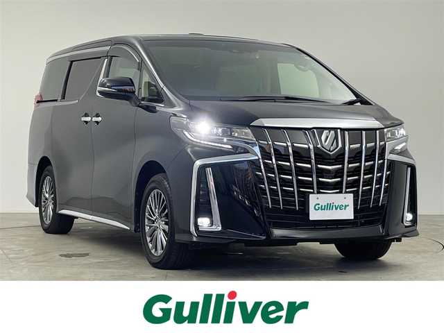 トヨタ アルファードハイブリット 千葉県 2023(令5)年 2.7万km ブラック トヨタセーフティーセンス/・プリクラッシュセーフティ/・レーントレーシングアシスト/・レーダークルーズコントロール/・アダクティブハイビームシステム/・オートマチックハイビーム/・パーキングサポートブレーキ/・ロードサインアシスト/・ブラインドスポットモニター/・インテリジェントクリアランスソナー/・デジタルインナーミラー/・パノラミックビューモニター/・インテリジェントパーキングアシスト/サンルーフ/両側パワースライドドア/純正メモリナビ/・CD/Bluetooth/フルセグTV/・JBLサウンド/フリップダウンモニター/全方位カメラ/デジタルインナーミラー/レザーシート/ベンチレーション/シートヒーター/ステアリングヒーター/オットマン/パワーバックドア/LEDオートヘッドライト/三眼シーケンシャルウィンカー/電子パーキングブレーキ/オートブレーキホールド/純正17インチアルミホイール/純正フロアマット/プッシュスタート/スマートキー/スペアキー1本/禁煙車