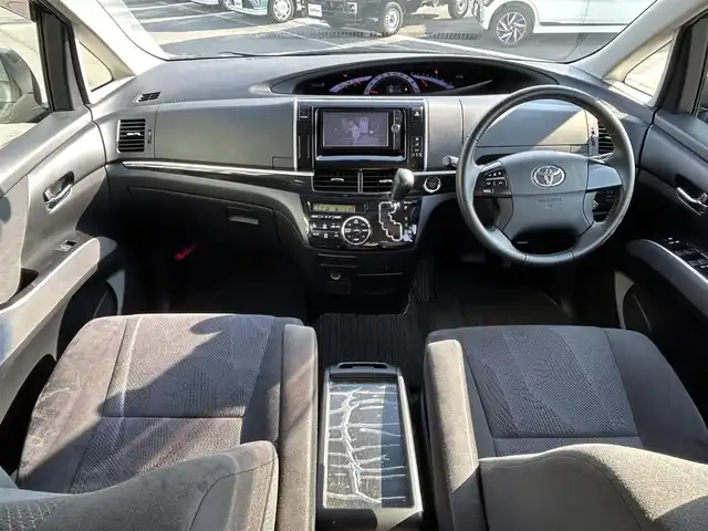 トヨタ エスティマ アエラス 兵庫県 2012(平24)年 5.6万km アイスチタニウムマイカメタリック 純正ナビ（Bluetooth/フルセグTV/DVD再生）/ETC/バックカメラ/クルーズコントロール/三列シート/二列目オットマン/前方ドライブレコーダー/両側パワースライドドア/フォグランプ/ISOFIX/ステアリングリモコン/ドアバイザー