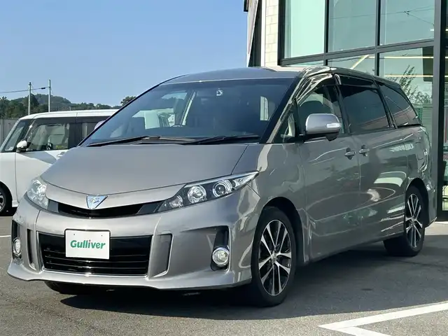 トヨタ エスティマ アエラス 兵庫県 2012(平24)年 5.6万km アイスチタニウムマイカメタリック 純正ナビ（Bluetooth/フルセグTV/DVD再生）/ETC/バックカメラ/クルーズコントロール/三列シート/二列目オットマン/前方ドライブレコーダー/両側パワースライドドア/フォグランプ/ISOFIX/ステアリングリモコン/ドアバイザー