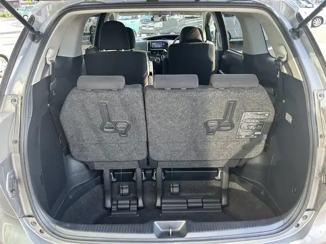 トヨタ エスティマ アエラス 兵庫県 2012(平24)年 5.6万km アイスチタニウムマイカメタリック 純正ナビ（Bluetooth/フルセグTV/DVD再生）/ETC/バックカメラ/クルーズコントロール/三列シート/二列目オットマン/前方ドライブレコーダー/両側パワースライドドア/フォグランプ/ISOFIX/ステアリングリモコン/ドアバイザー