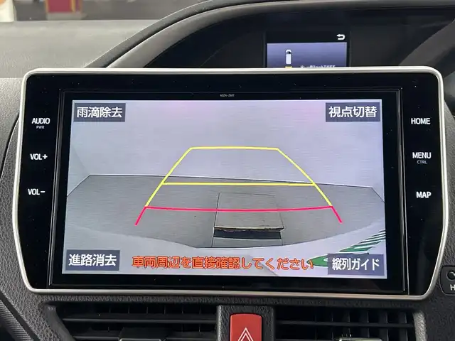トヨタ ヴォクシー ハイブリッド ZS 煌Ⅲ 愛知県 2021(令3)年 5.8万km ホワイトパールクリスタルシャイン 禁煙車/純正10インチナビ/（CD/DVD/Bluetooth/フルセグTV/HDMI/SD)/バックカメラ/フリップダウンモニター/トヨタセーフティセンス/・プリクラッシュセーフティ/・レーンディパーチャーアラート/・オートマチックハイビーム/クルーズコントロール/ETC2.0/シートヒーター/両側パワースライドドア/純正16インチアルミホイール/LEDヘッドライト/フロントフォグランプ/オートライト/純正フロアマット/スマートキー/プッシュスタート/横滑り防止装置