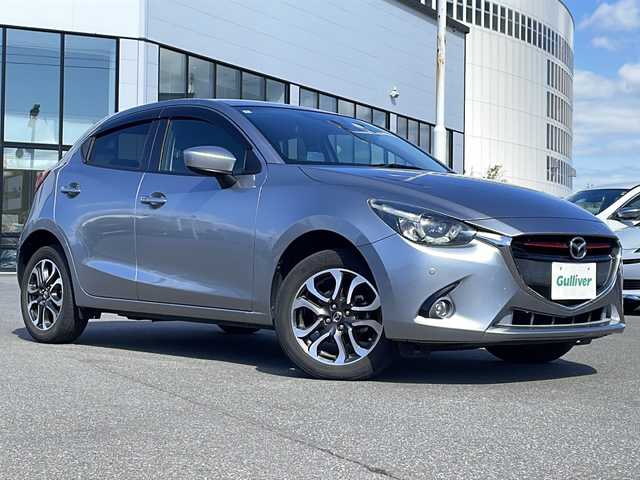 マツダ デミオ XD ツーリング 青森県 2015(平27)年 8.4万km アルミニウムメタリック ・4WD/・ディーゼルターボ/・純正ナビ/・Bluetooth/・フルセグTV/・バックカメラ/・衝突軽減ブレーキ/・クルーズコントロール/・レーンキープアシスト/・コーナーセンサー/・純正LEDヘッドライト/・純正16AW/・オートライト/・プッシュスタート/・スマートキー/・パドルシフト/・スペアキーあり