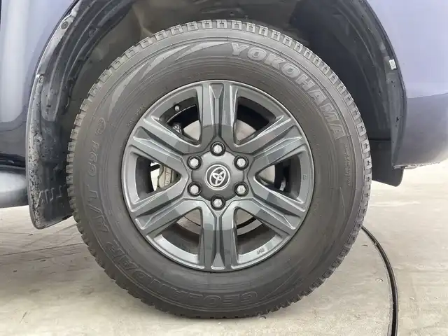 トヨタ ハイラックス Z 三重県 2021(令3)年 1.9万km ダークブルーマイカ /禁煙車//純正7型ナビ/　フルセグTV/Bluetooth//TRD製格納ステップ//コーナーセンサー//フォグライト//レーダークルーズコントロール//純正アルミホイール//前後ドラレコ//バックカメラ//鍵付きトノカバー//ヒッチメンバー//ETC//ステアリングスイッチ//プッシュスタート//スマートキー