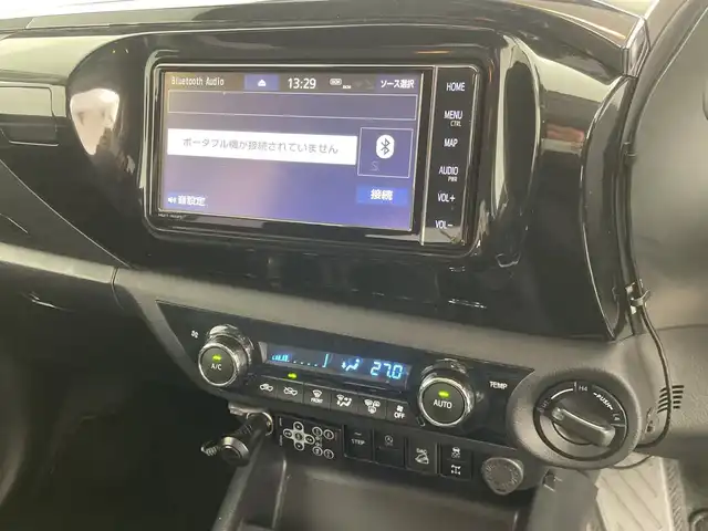 トヨタ ハイラックス Z 三重県 2021(令3)年 1.9万km ダークブルーマイカ /禁煙車//純正7型ナビ/　フルセグTV/Bluetooth//TRD製格納ステップ//コーナーセンサー//フォグライト//レーダークルーズコントロール//純正アルミホイール//前後ドラレコ//バックカメラ//鍵付きトノカバー//ヒッチメンバー//ETC//ステアリングスイッチ//プッシュスタート//スマートキー