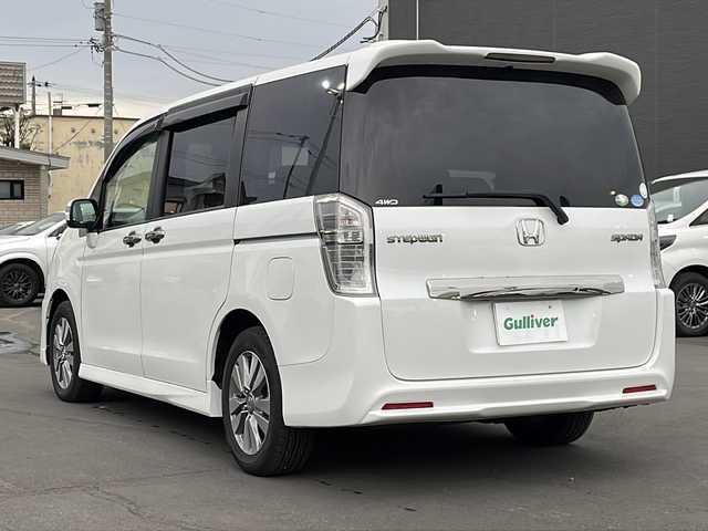 ホンダ ステップワゴン スパーダ Z クールスピリット 道北・旭川 2013(平25)年 7万km ホワイトオーキッドパール ・社外ナビ（CD、DVD、SD、BT、TV、ラジオ）/・バックモニター/・スマートキー/・スペアキー/・エンジンスターター/・アイドリングストップ/・フロントデアイサー/・ミラーヒーター/・クルーズコントロール/・パドルシフト/・両側パワースライドドア/・ハーフレザーシート/・純正フロアマット/・ドアバイザー/・HIDヘッドライト/・フォグランプ/・冬タイヤ積み込み/・４WD/・取扱説明書/・保証書