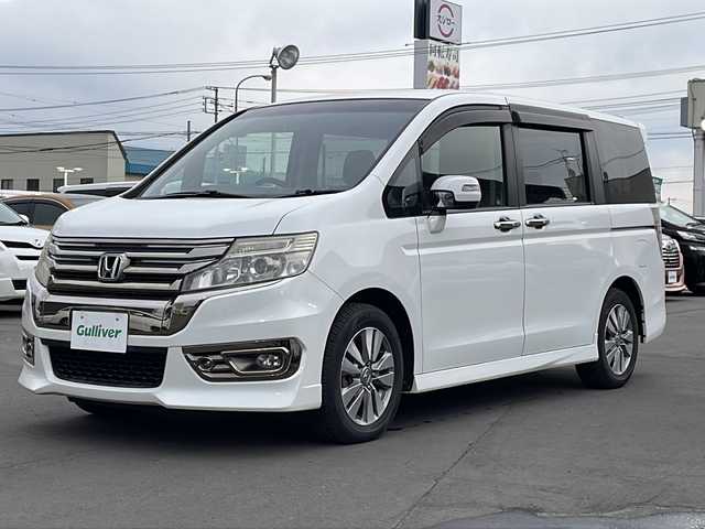 ホンダ ステップワゴン スパーダ Z クールスピリット 道北・旭川 2013(平25)年 7万km ホワイトオーキッドパール ・社外ナビ（CD、DVD、SD、BT、TV、ラジオ）/・バックモニター/・スマートキー/・スペアキー/・エンジンスターター/・アイドリングストップ/・フロントデアイサー/・ミラーヒーター/・クルーズコントロール/・パドルシフト/・両側パワースライドドア/・ハーフレザーシート/・純正フロアマット/・ドアバイザー/・HIDヘッドライト/・フォグランプ/・冬タイヤ積み込み/・４WD/・取扱説明書/・保証書