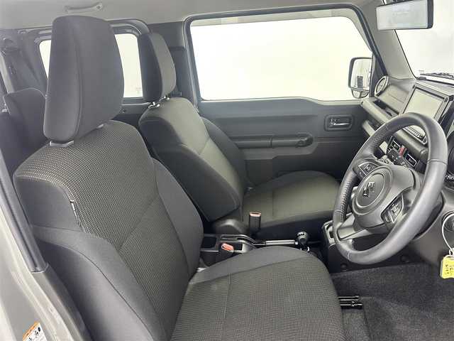 スズキ ジムニー XC 愛知県 2024(令6)年 1.7万km ミディアムグレー 4WD/インタークーラー付ターボ/純正8インチSDナビ/フルセグTV/ドライブレコーダー/デジタルインナーミラー/ETC/ステアリングリモコン/クルーズコントロール/アイドリングストップ/フルフラットシート/シートヒーター/背面タイヤ/純正センターホイールキャップ/コーナーセンサー/デュアルセンサーブレーキサポート/誤発信抑制機能/車線逸脱警報機能/取扱説明書/保証書/スマートキー/スペアキー