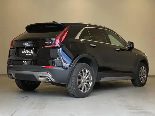 キャデラック ＸＴ４ プレミアム 熊本県 2021(令3)年 3.5万km 黒 ・スマートキー/・プッシュスタート/・前面衝突警告ブレーキ/・レーンキープアシスト/・リアクロストラフィックアラート/・リア歩行書検知/・パーキングセンサー/・オートハイビーム/・クルーズコントロール(追従式)/・黒革シート/・前席パワーシート/・全席シートヒーター /・純正ディスプレイオーディオ/　【Bluetooth・USB・AppleCarPlay・AndroidAuto】/・全方位カメラ/・ETC/・ドライブレコーダー(全方位録画)/・デジタルインナーミラー/・パワーバックドア/・LEDヘッドランプ/・純正マット/・保証書/取説