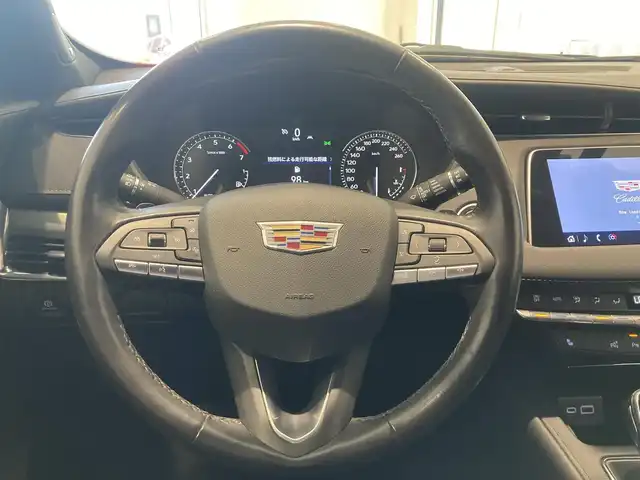 キャデラック ＸＴ４ プレミアム 熊本県 2021(令3)年 3.5万km 黒 ・スマートキー/・プッシュスタート/・前面衝突警告ブレーキ/・レーンキープアシスト/・リアクロストラフィックアラート/・リア歩行書検知/・パーキングセンサー/・オートハイビーム/・クルーズコントロール(追従式)/・黒革シート/・前席パワーシート/・全席シートヒーター /・純正ディスプレイオーディオ/　【Bluetooth・USB・AppleCarPlay・AndroidAuto】/・全方位カメラ/・ETC/・ドライブレコーダー(全方位録画)/・デジタルインナーミラー/・パワーバックドア/・LEDヘッドランプ/・純正マット/・保証書/取説