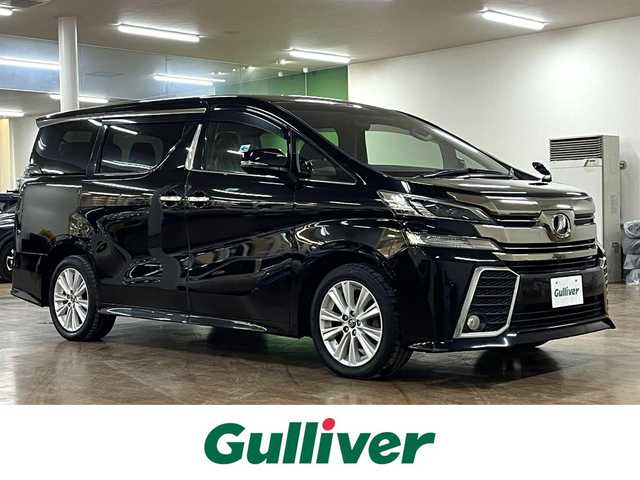 トヨタ ヴェルファイア Z Aエディション 道央・札幌 2016(平28)年 12.9万km ブラック 4WD/寒冷地仕様/社外ナビ/・フルセグTV/CD/DVD/BT/SD/社外フリップダウンモニター/バックカメラ/両側パワースライドドア/純正エンジンスターター/横滑り防止装置/アイドリングストップ/クルーズコントロール/ETC/電動パーキングブレーキ/ブレーキホールド/前後コーナーセンサー/オートライト/LEDヘッドライト/前後フォグライト/プッシュスタート/スマートキー/ウインカーミラー/純正フロアマット/純正ドアバイザー/純正18インチAW/助手席、2列目オットマン/3列シート