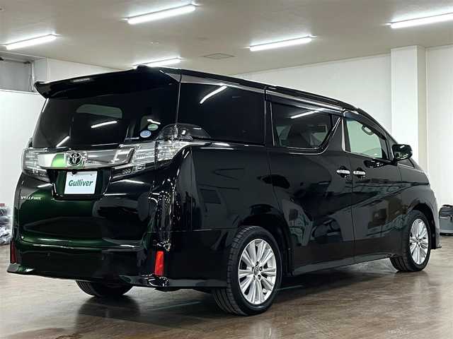 トヨタ ヴェルファイア Z Aエディション 道央・札幌 2016(平28)年 12.9万km ブラック 4WD/寒冷地仕様/社外ナビ/・フルセグTV/CD/DVD/BT/SD/社外フリップダウンモニター/バックカメラ/両側パワースライドドア/純正エンジンスターター/横滑り防止装置/アイドリングストップ/クルーズコントロール/ETC/電動パーキングブレーキ/ブレーキホールド/前後コーナーセンサー/オートライト/LEDヘッドライト/前後フォグライト/プッシュスタート/スマートキー/ウインカーミラー/純正フロアマット/純正ドアバイザー/純正18インチAW/助手席、2列目オットマン/3列シート
