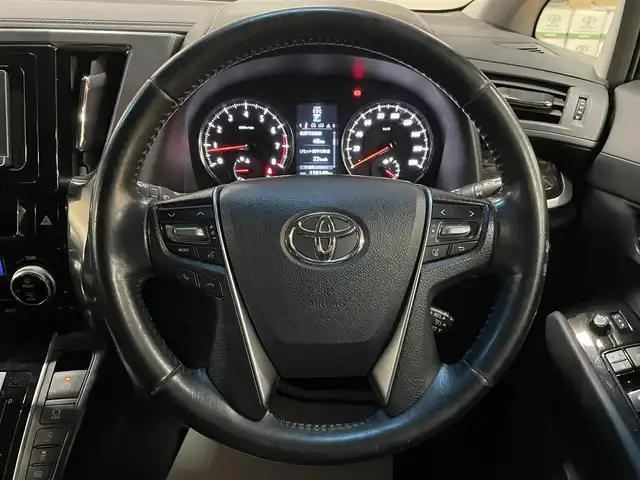 トヨタ ヴェルファイア Z Aエディション 道央・札幌 2016(平28)年 12.9万km ブラック 4WD/寒冷地仕様/社外ナビ/・フルセグTV/CD/DVD/BT/SD/社外フリップダウンモニター/バックカメラ/両側パワースライドドア/純正エンジンスターター/横滑り防止装置/アイドリングストップ/クルーズコントロール/ETC/電動パーキングブレーキ/ブレーキホールド/前後コーナーセンサー/オートライト/LEDヘッドライト/前後フォグライト/プッシュスタート/スマートキー/ウインカーミラー/純正フロアマット/純正ドアバイザー/純正18インチAW/助手席、2列目オットマン/3列シート