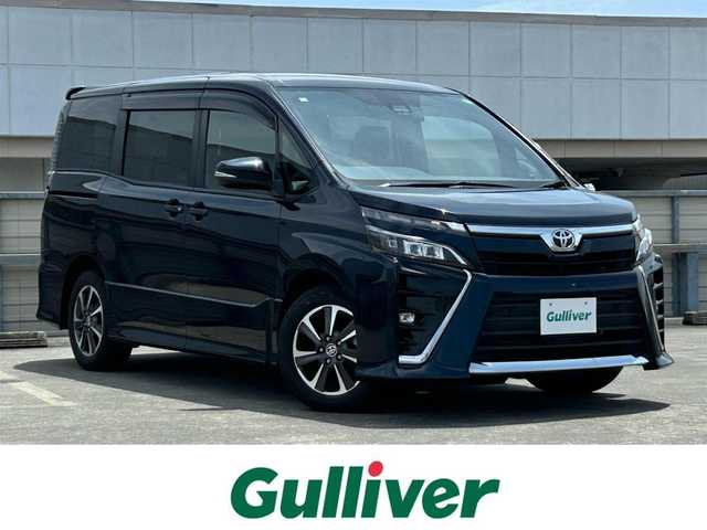 トヨタ ヴォクシー ZS 静岡県 2020(令2)年 3.7万km ブラッキッシュアゲハガラスフレーク ７人乗り/トヨタセーフティセンス/純正１０型ＳＤナビ/フルセグＴＶ/１２．１型後席モニター/ＢＴオーディオ/ドラレコ/ビルトインＥＴＣ２．０/バックカメラ/両側電動スライドドア/ＬＥＤオートライト/純正１６ＡＷ