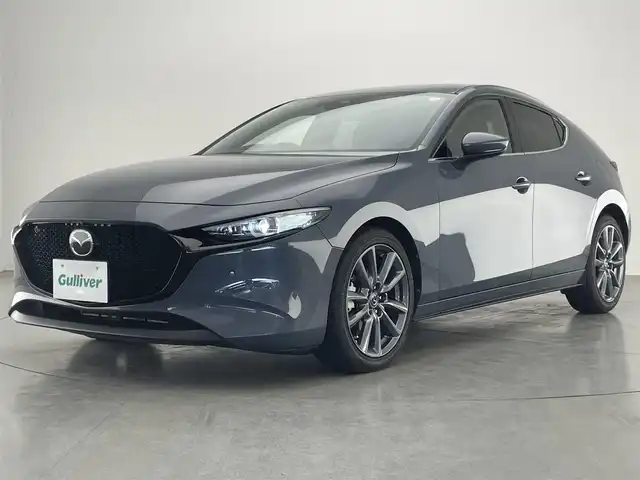 マツダ マツダ３ファストバック 20S バーガンディセレクション 愛知県 2020(令2)年 5.6万km ポリメタルグレーM 純正８．８インチナビ/360度セーフティパッケージ/アラウンドビューモニター/ヘッドアップディスプレイ/ブラインドスポットモニター/HDMI/パドルシフト/赤革シート/レーダークルーズコントロール/シートヒーター/パワーシート/ETC/純正アルミホイール/純正フロアマット/コーナーセンサー/LEDオートライト/フルセグTV/衝突被害軽減ブレーキ/ステアリングヒーター/車線逸脱/禁煙車