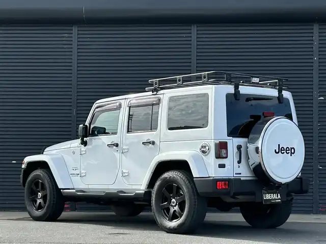 クライスラー・ジープ ジープ ラングラー アンリミテッド サハラ 茨城県 2018(平30)年 6.2万km 白 ワンオ-ナ- /茶革 /シートヒーター /ナビ /TV /B/Sカメラ /LED /ハードトップ背面タイヤカバー /シルバーフューエルキャップ /クルーズコントロール /BT/DVD/CD /ETC /ルーフラック /純正アルミ付きサマータイヤ有り /禁煙車