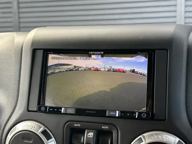 クライスラー・ジープ ジープ ラングラー アンリミテッド サハラ 茨城県 2018(平30)年 6.2万km 白 ワンオ-ナ- /茶革 /シートヒーター /ナビ /TV /B/Sカメラ /LED /ハードトップ背面タイヤカバー /シルバーフューエルキャップ /クルーズコントロール /BT/DVD/CD /ETC /ルーフラック /純正アルミ付きサマータイヤ有り /禁煙車