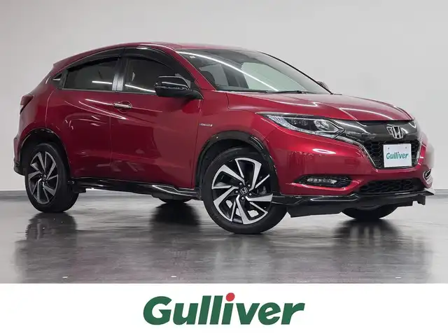 ホンダ ヴェゼル ハイブリッド RS ホンダセンシング 三重県 2017(平29)年 4.3万km プレミアムクリスタルレッドM ハイブリッド/FF/MTモード付フロア7DCT i-DCD/純正 8インチナビ VXM-175VFEi/（CD/DVD/FM/AM/TV/Music Rack/iPod/SD/USB/Bluetooth/VTR/AUX/HDMI/AppleCarPlay）/バックカメラ/ドライブレコーダー 前方/ビルトイン ETC/Honda SENSING/・衝突軽減ブレーキ［CMBS］/・車線維持支援システム［LKAS］/・アダプティブクルーズコントロール［ACC］/・路外逸脱抑制機能/・標識認識機能/・リアクティブフォースペダル［RFP］/装備/・ハーフレザーシート/・シートヒーター（D/N）/・左右独立オートエアコン/・パドルシフト/・電子パーキングブレーキ＋オートブレーキホールド/・自動防眩ルームミラー/・熱線入りフロントワイパー/・ステアリングスイッチ/・後席チップアップ機能/・純正18inAW/・プッシュスタート/・スマートキーx2/・保/取/ナビ取/など