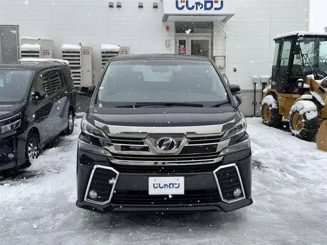 トヨタ ヴェルファイア Z Aエディション 道央・札幌 2015(平27)年 14.7万km バーニングブラッククリスタルシャインガラスフレーク (株)IDOMが運営する【じしゃロン札幌豊平店】の自社ローン対象車両になります。こちらは現金ご利用時の価格です。/自社ローンご希望の方は別途その旨お申付け下さい。/プッシュスタート/純正ナビ・フルセグTV/バックカメラ/フリップダウンモニター/両側パワースライドドア/ETC