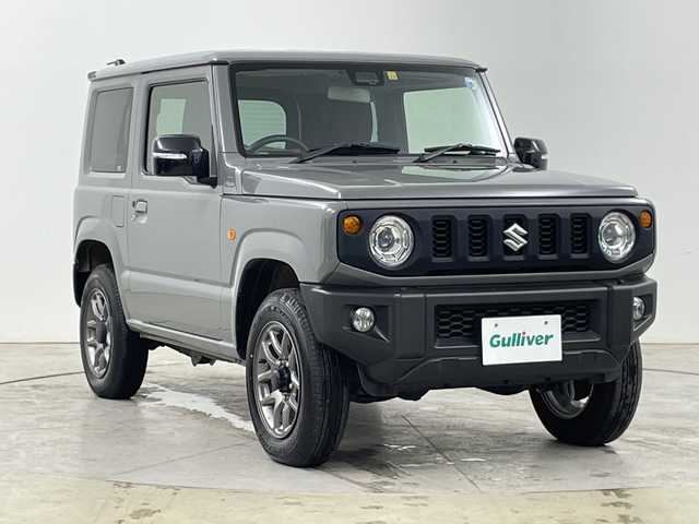 スズキ ジムニー XC 道央・札幌 2022(令4)年 1.7万km ミディアムグレー ・４ＷＤ　/スズキ セーフティ サポート/・デュアルセンサーブレーキサポート/・社外ナビ/・フルセグTV/BT/DVD/・バックカメラ　/・クルーズコントロール　/・シートヒーター　/・ＥＴＣ　/・ダウンヒルアシストコントロール　/・横滑り防止装置　/・レーンキープアシスト　/・オートライト　/・ＬＥＤヘッドライト　/・プッシュスタート/・社外AW付スタッドレスタイヤ積込