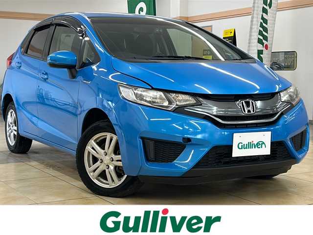 ホンダ フィット ハイブリット Fパッケージ 道央・札幌 2014(平26)年 12.7万km ビビットスカイブルーP ・4WD/・バックカメラ/・ドライブレコーダー/・ETC/・横滑り防止/・ワイパーデアイサー/・プッシュスタート/・スマートキー/・ドアバイザー/・電格ミラー/・ミラーヒーター