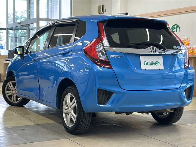 ホンダ フィット ハイブリット Fパッケージ 道央・札幌 2014(平26)年 12.7万km ビビットスカイブルーP ・4WD/・バックカメラ/・ドライブレコーダー/・ETC/・横滑り防止/・ワイパーデアイサー/・プッシュスタート/・スマートキー/・ドアバイザー/・電格ミラー/・ミラーヒーター