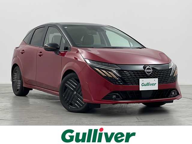 日産 オーラ G  90周年記念車 群馬県 2024(令6)年 0.2万km ガーネットレッド/スーパーブラック 2トーン 純正９型ナビ　全周囲カメラ　ＢＯＳＥサウンド　電子ミラー　ワイヤレス充電器　プロパイロット　アダプティブクルーズコントロール　ドラレコ　純正アルミホイール　オートブレーキホールド　ＬＥＤライト　禁煙