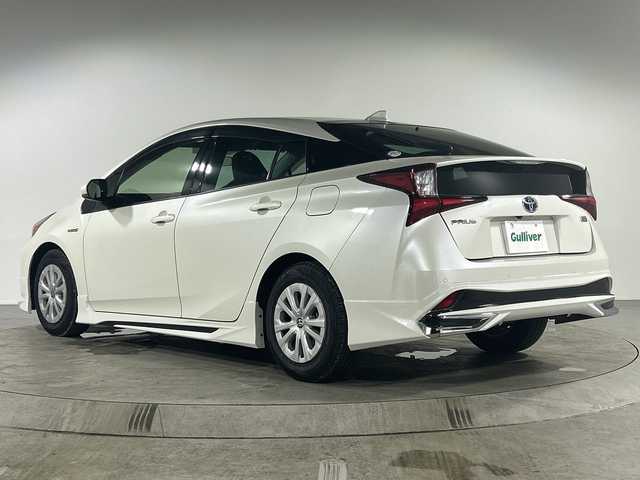 トヨタ プリウス S 福岡県 2019(平31)年 8.4万km ホワイトパールクリスタルシャイン 禁煙車/純正メモリナビ/・CD/SD/BT/ワンセグTV/・バックモニター/トヨタセーフティセンス/モデリスタエアロ/クリアランスソナー/革巻きステアリング/・ステアリングリモコン/LEDヘッドライト/・オートライト/ETC/純正フロアマット/純正ドアバイザー