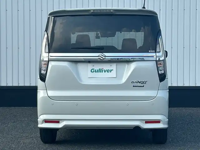 スズキ ソリオ バンディット HV MV 千葉県 2023(令5)年 0.9万km ピュアホワイトP 純正メモリナビ/（CD/DVD/BT/TV)/バックカメラ/衝突被害軽減システム/車線逸脱警報/レーダークルーズコントロール/パワースライドドア/ヘッドアップディスプレイ/シートヒーター/ETC/ドライブレコーダー/アイドリングストップ/LEDヘッドライト/フォグランプ/オートライト/ウィンカーミラー/電動格納ミラー/純正15インチAW/シートヒーター/プッシュスタート/ドアバイザー/取扱説明書/保証書