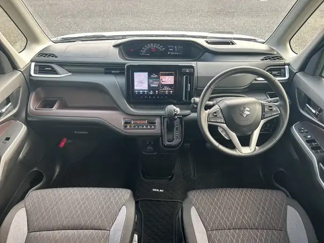 スズキ ソリオ バンディット HV MV 千葉県 2023(令5)年 0.9万km ピュアホワイトP 純正メモリナビ/（CD/DVD/BT/TV)/バックカメラ/衝突被害軽減システム/車線逸脱警報/レーダークルーズコントロール/パワースライドドア/ヘッドアップディスプレイ/シートヒーター/ETC/ドライブレコーダー/アイドリングストップ/LEDヘッドライト/フォグランプ/オートライト/ウィンカーミラー/電動格納ミラー/純正15インチAW/シートヒーター/プッシュスタート/ドアバイザー/取扱説明書/保証書