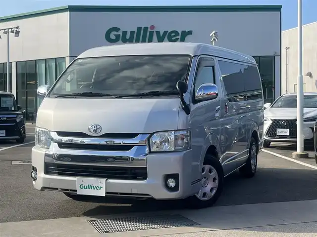 トヨタ ハイエース GL 愛媛県 2016(平28)年 5.6万km シルバーM 登録時走行距離：55299km/10人乗り/社外ナビ/AM/FM/ワンセグTV/DVD/CD/Bluetooth/ETC/バックカメラ/サイドアンダーミラー/サーキュレーター/後席背面ジュースホルダー/キセノンヘッドライト/フォグランプ/リモコンキー/純正フロアマット