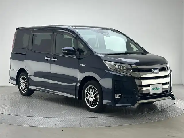 トヨタ ノア ハイブリッド Si ダブルバイビーⅡ 兵庫県 2019(平31)年 6.8万km ブラッキッシュアゲハガラスフレーク 衝突軽減ブレーキ/純正10インチナビ＆フルセグTV/（CD＆DVD＆BT）/フリップダウンモニター/バックカメラ/クルーズコントロール/前後ドライブレコーダー/ETC2.0/ハーフレザーシート/シートヒーター/両側電動スライドドア/オートライト/LEDライト/前後コーナーセンサー/Wエアバッグ