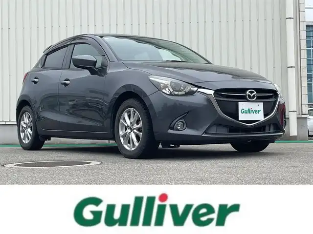 マツダ デミオ 13S 富山県 2015(平27)年 4.9万km メテオグレーマイカ ＬＥＤコンフォートパッケージ/メーカーナビ/フルセグＴＶ/Ｂｌｕｅｔｏｏｔｈ/ＤＶＤ再生/ビルトインＥＴＣ/アイドリングストップ/ＬＥＤオートライト/衝突軽減ブレーキ