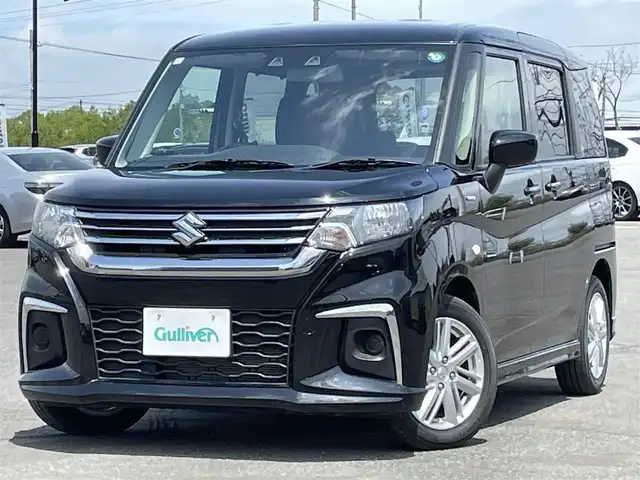スズキ ソリオ HV MZ 道央・札幌 2024(令6)年 1.5万km スーパーブラックパール ４WD/社外SDナビ/CD/BT/フルセグ/スズキセーフティサポート/衝突被害軽減ブレーキ/横滑り防止装置/レーダークルーズコントロール/レーンキープアシスト/リヤパーキングセンサー/バックカメラ/ETC/アイドリングストップ/片側パワースライドドア/前席シートヒーター/ステアリングリモコン/プッシュスタート/スマートキー/ハロゲンヘッドライト/オートライト/オートハイビーム/ヘッドライトレベライザー/電動格納ミラー/ヒーテッドドアミラー/フロアマット/レンタカー登録