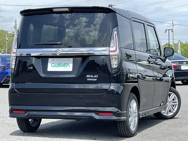 スズキ ソリオ HV MZ 道央・札幌 2024(令6)年 1.5万km スーパーブラックパール ４WD/社外SDナビ/CD/BT/フルセグ/スズキセーフティサポート/衝突被害軽減ブレーキ/横滑り防止装置/レーダークルーズコントロール/レーンキープアシスト/リヤパーキングセンサー/バックカメラ/ETC/アイドリングストップ/片側パワースライドドア/前席シートヒーター/ステアリングリモコン/プッシュスタート/スマートキー/ハロゲンヘッドライト/オートライト/オートハイビーム/ヘッドライトレベライザー/電動格納ミラー/ヒーテッドドアミラー/フロアマット/レンタカー登録