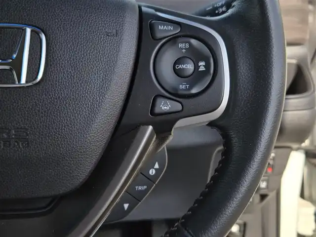 ホンダ フリード ハイブリット EX 鹿児島県 2019(令1)年 3.8万km ホワイトオーキッドパール アダプティブクルーズコントロール　/両側パワースライドドア　/ビルトインＥＴＣ　/イノー製ルーフキャリア／ルーフレール　/前後ドライブレコーダー　/ホンダセンシング　/本革巻きステアリング　/Ｄ＋Ｎ席シートヒーター/純正SDナビ(VXM-194VFi)/プッシュスタート/スマートキー/Bluetoothオーディオ/レーンキープアシスト/横滑り防止装置/LEDヘッドライト/カーテンエアバック/エアバッグ(W+サイド)