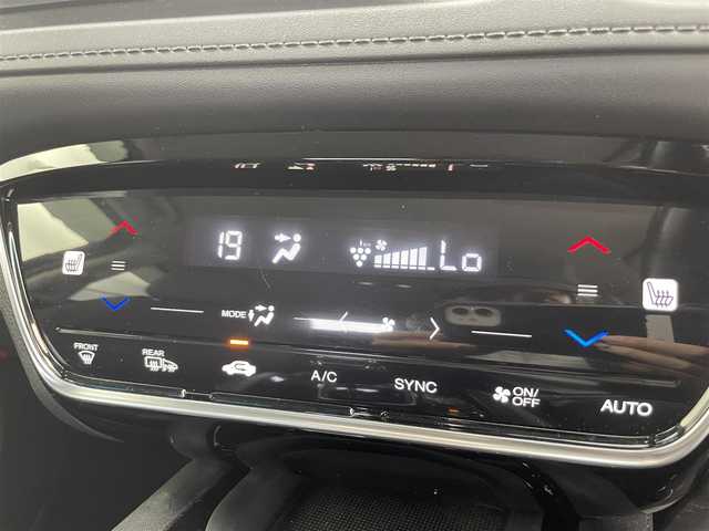 ホンダ ヴェゼル ハイブリッド 富山県 2019(令1)年 6万km ミッドナイトブルービームM 社外ナビ（AM/FM/CD/DVD/USB/SD/BT/HDMI）/フルセグTV/バックカメラ/寒冷地仕様/衝突被害軽減ブレーキ/アダプティブクルーズコントロール/レーンキープアシスト/オートライト/LEDヘッドライト/ハーフレザーシート/前席シートヒーター/ビルトインETC/ドライブレコーダー/パドルシフト/スマートキー×２/プッシュスタート/アイドリングストップ/保証書