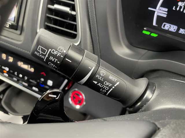 ホンダ ヴェゼル ハイブリッド 富山県 2019(令1)年 6万km ミッドナイトブルービームM 社外ナビ（AM/FM/CD/DVD/USB/SD/BT/HDMI）/フルセグTV/バックカメラ/寒冷地仕様/衝突被害軽減ブレーキ/アダプティブクルーズコントロール/レーンキープアシスト/オートライト/LEDヘッドライト/ハーフレザーシート/前席シートヒーター/ビルトインETC/ドライブレコーダー/パドルシフト/スマートキー×２/プッシュスタート/アイドリングストップ/保証書