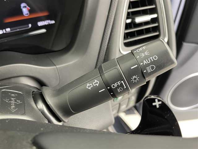 ホンダ ヴェゼル ハイブリッド 富山県 2019(令1)年 6万km ミッドナイトブルービームM 社外ナビ（AM/FM/CD/DVD/USB/SD/BT/HDMI）/フルセグTV/バックカメラ/寒冷地仕様/衝突被害軽減ブレーキ/アダプティブクルーズコントロール/レーンキープアシスト/オートライト/LEDヘッドライト/ハーフレザーシート/前席シートヒーター/ビルトインETC/ドライブレコーダー/パドルシフト/スマートキー×２/プッシュスタート/アイドリングストップ/保証書
