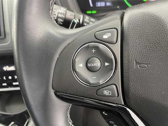 ホンダ ヴェゼル ハイブリッド 富山県 2019(令1)年 6万km ミッドナイトブルービームM 社外ナビ（AM/FM/CD/DVD/USB/SD/BT/HDMI）/フルセグTV/バックカメラ/寒冷地仕様/衝突被害軽減ブレーキ/アダプティブクルーズコントロール/レーンキープアシスト/オートライト/LEDヘッドライト/ハーフレザーシート/前席シートヒーター/ビルトインETC/ドライブレコーダー/パドルシフト/スマートキー×２/プッシュスタート/アイドリングストップ/保証書