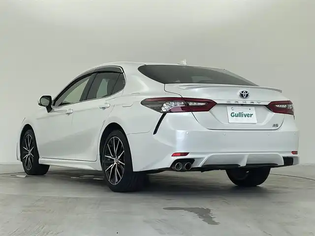 トヨタ カムリ WSレザーパッケージ 群馬県 2023(令5)年 4.9万km プラチナホワイトパールマイカ おくだけ充電/＝＝＝＝＝/純正9インチディスプレイオーディオ/・AM/FM/USB/Bluetooth/・AppleCarPlay/AndroidAuto/Miracast/バックカメラ/トヨタセーフティセンス/・プリクラッシュセーフティ(歩行者［昼夜］/自転車運転者［昼］検知機能付衝突回避支援タイプ/ミリ波レーダー＋単眼カメラ方式）/・カーブ速度抑制機能/・レーントレーシングアシスト/・ドライバー異常時対応システム/・オートマチックハイビーム/・ロードサインアシスト/・レーダークルーズコントロール(全車速追従機能付)/先行車発進告知機能/パーキングサポートブレーキ(前後方静止物/後方接近車両)/ブラインドスポットモニター/黒本革シート/前席パワーシート/シートヒーター/電動パーキングブレーキ/オートブレーキホールド/Bi-Beam LEDヘッドランプ(オートレベリング機能付)