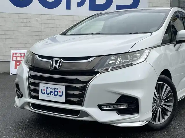 ホンダ オデッセイ G エアロ ホンダセンシング 佐賀県 2018(平30)年 12.5万km プラチナホワイトパール 株)IDOMが運営する【じしゃロン佐賀店】の自社ローン専用車両になります。/こちらは現金またはオートローンご利用時の価格です。自社ローンご希望の方は別途その旨お申付け下さい/純正ナビ/（CD/DVD/BT/TV/USB)/バックカメラ/ステアリングリモコン/両側パワースライドドア/ホンダセンシング/ETC2.0/アイドリングストップ/LEDヘッドライト/オートライト/純正フロアマット/純正ドアバイザー/スペアキー