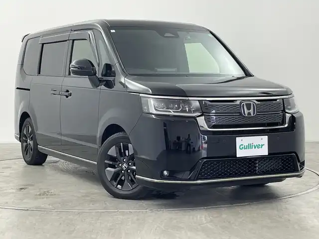 ホンダ ステップワゴン スパーダ eHEV 群馬県 2024(令6)年 1.7万km クリスタルブラックパール 純正１１．４型純正ナビ　バックカメラ　両側電動スライドドア　電動リアゲート　ハーフレザーシート　シートヒーター　ＥＴＣ　アダプティブクルーズコントロール　衝突被害軽減ブレーキ　ＢＳＭ　ＬＥＤ　禁煙車