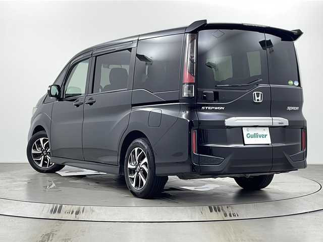 ホンダ ステップワゴン スパーダ ホンダセンシング 埼玉県 2017(平29)年 6.7万km プレミアムスパークルブラックパール 純正9型ナビ/（フルセグTV/BT/CD/DVD/AM/FM）/バックカメラ/ホンダセンシング/・衝突軽減ブレーキ/・渋滞追従機能付アダプティブクルーズコントロール/・路外逸脱抑制機能/両側パワースライドドア/ビルトインETC/純正アルミホイール/純正フロアマット/LEDライト
