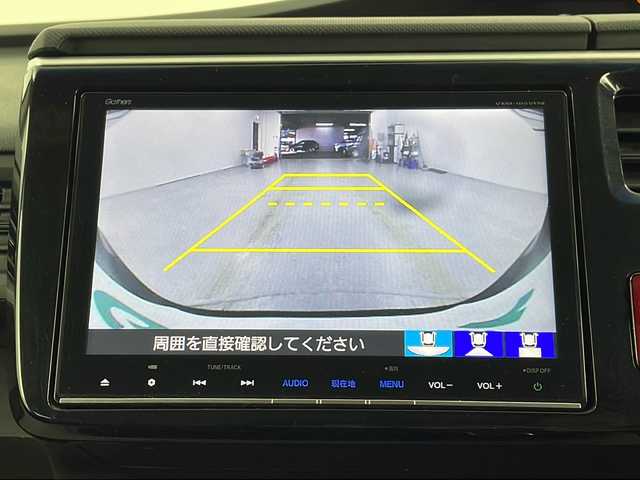 ホンダ ステップワゴン スパーダ ホンダセンシング 埼玉県 2017(平29)年 6.7万km プレミアムスパークルブラックパール 純正9型ナビ/（フルセグTV/BT/CD/DVD/AM/FM）/バックカメラ/ホンダセンシング/・衝突軽減ブレーキ/・渋滞追従機能付アダプティブクルーズコントロール/・路外逸脱抑制機能/両側パワースライドドア/ビルトインETC/純正アルミホイール/純正フロアマット/LEDライト