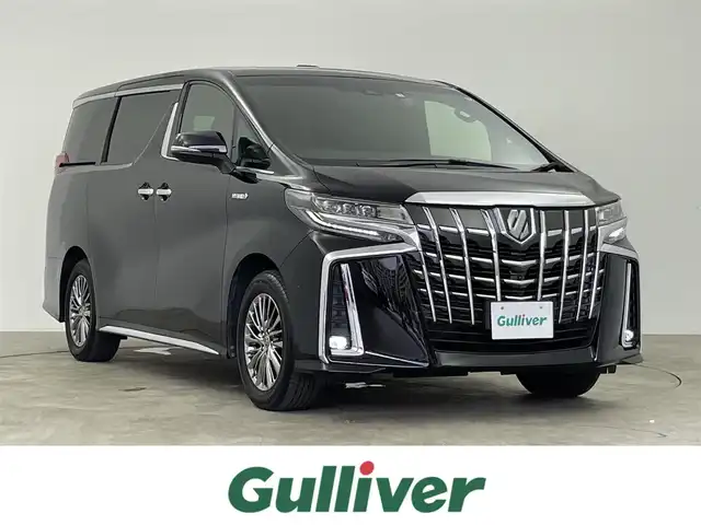 トヨタ アルファードハイブリット エグゼクティブ ラウンジ S 千葉県 2021(令3)年 1.9万km ブラック 4WD/ツインムーンルーフ/フリップダウンモニター/トヨタセーフティセンス/・プリクラッシュセーフティ/・レーントレーシングアシスト/・ロードサインアシスト/・アダプティブクルーズコントロール/・ブラインドスポットモニター/・クリアランスソナー/純正10インチメモリナビ/CD DVD HDMI BT フルセグ/パノラミックビューモニター/JBLサウンドシステム/両側パワースライドドア/3眼LEDヘッドライト/レザーシート/シートヒーター/ベンチレーション/メモリ付きパワーシート/デジタルインナーミラー/プッシュスタート/スマートキー/ビルトインETC2.0
